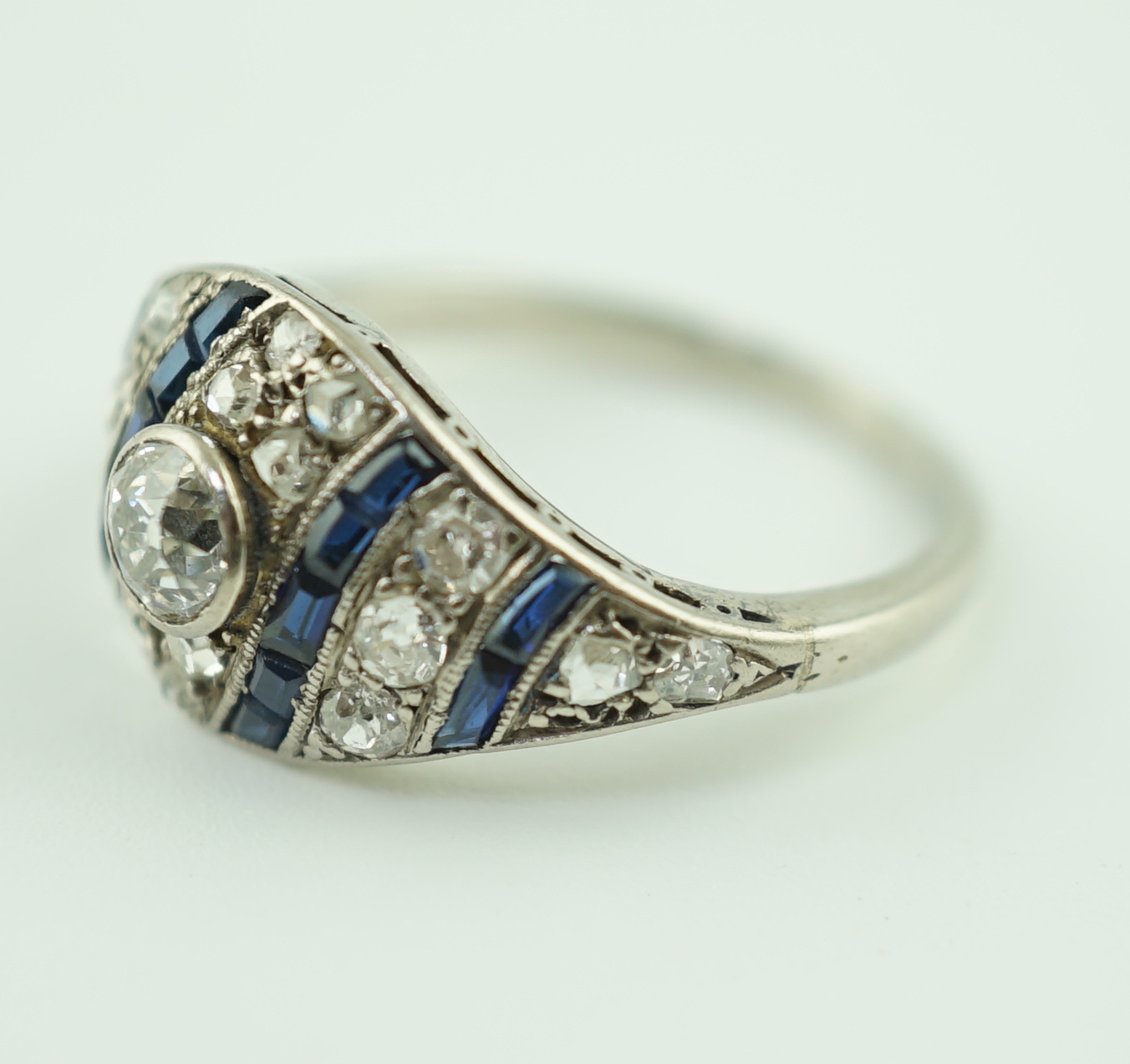 A 1940's/1950's 18ct white gold, sapphire and diamond set cluster ring